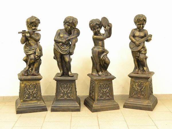  Quattro sculture, sec. XX,  in metallo bronzato, 