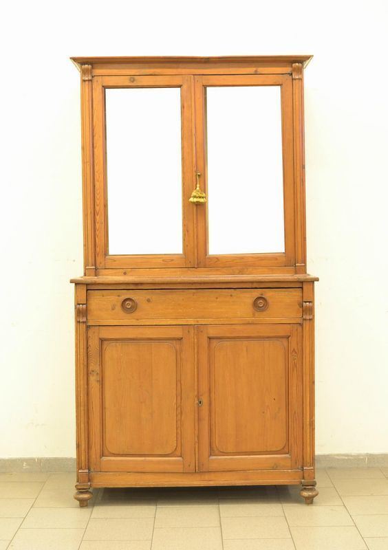  Vetrina, Toscana, sec. XIX,  in abete, a due corpi, quattro sportelli 