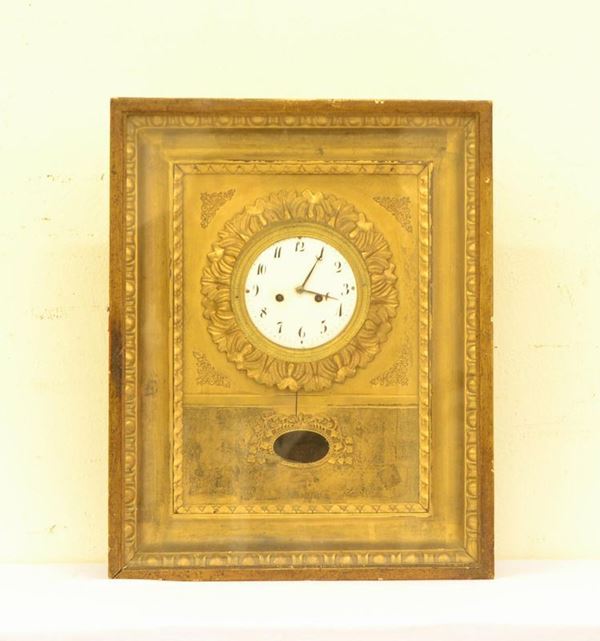 Orologio da parete, Francia, sec. XIX,  in legno dorato e lavorato a 