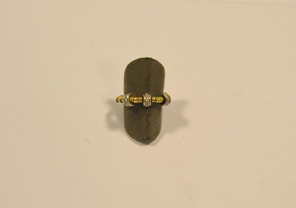   Anello in oro giallo, oro bianco e diamanti  