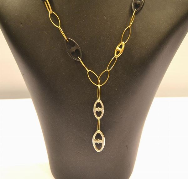  Collana in oro giallo, oro bianco,brillanti e legno 