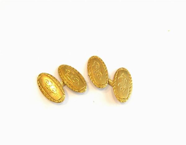  Paio di gemelli in oro giallo 