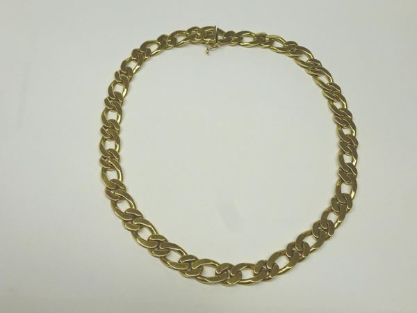 COLLANA IN ORO GIALLO realizzata ad una fila di maglie barbazzale ovali e rotonde, punzone 750, g 10