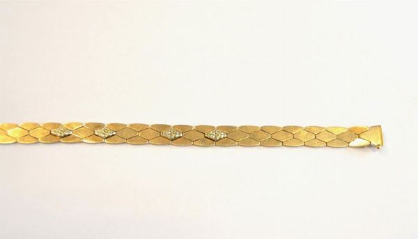   Braccialetto in oro giallo e oro bianco  