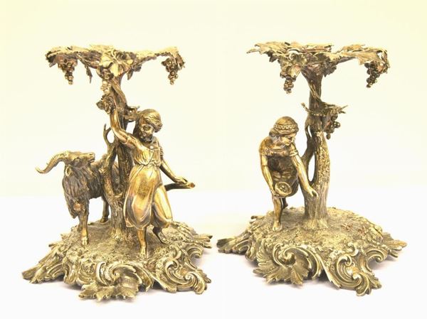  Due candelieri in metallo argentato   - Asta Gioielli, argenti, modernariato, mobili e dipinti - Poggio Bracciolini Casa d'Aste
