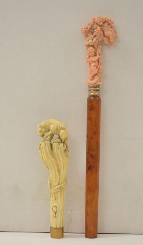   Coppia di manici da bastone  in avorio e corallo                           - Asta Gioielli, argenti, modernariato, mobili e dipinti - Poggio Bracciolini Casa d'Aste
