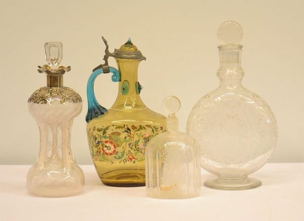 Quattro bottiglie, sec. XX, in vetro