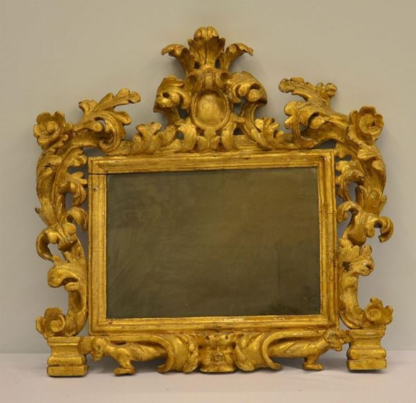 Specchiera, in stile 700, in legno intagliato e  - Asta Antiquariato, Collezionismo & Gioielli - Poggio Bracciolini Casa d'Aste