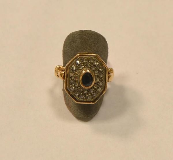 Anello in oro giallo ,argento, zaffiro e diamanti