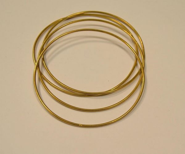 Quattro bracciali in oro