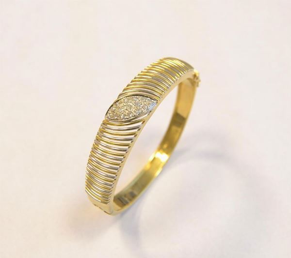Bracciale in oro giallo, oro bianco e diamanti