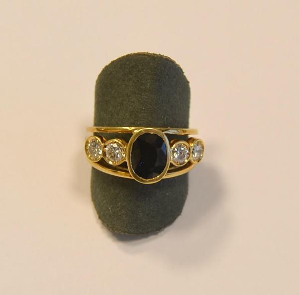 Anello in oro giallo,diamanti e zaffiro
