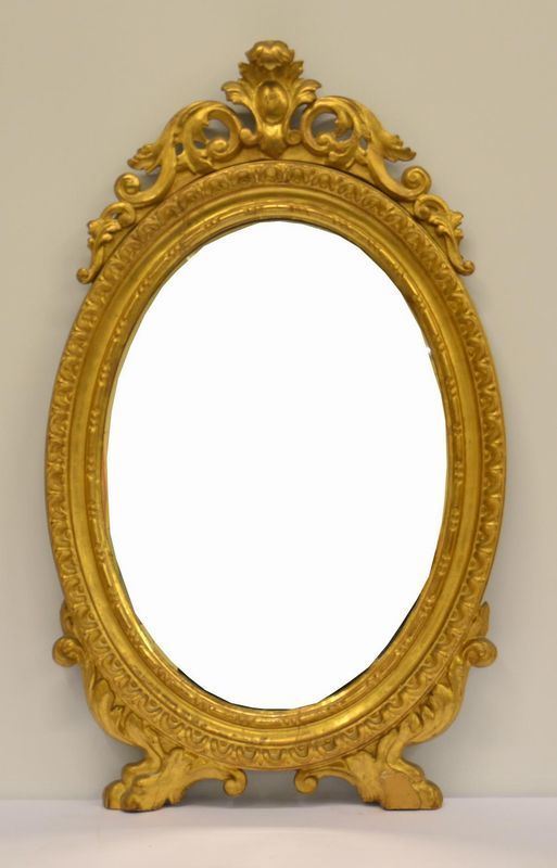 Specchiera ovale, sec. XIX, in cornice