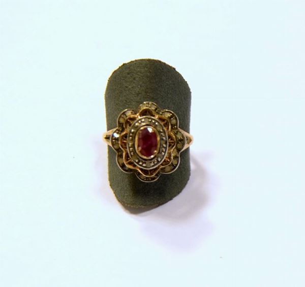 Anello in oro giallo a basso titolo, argento,diamanti e rubino