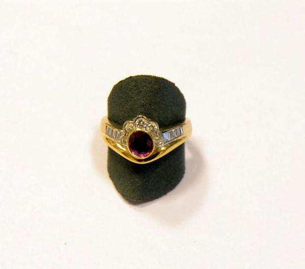 Anello in oro giallo, diamanti e rubino