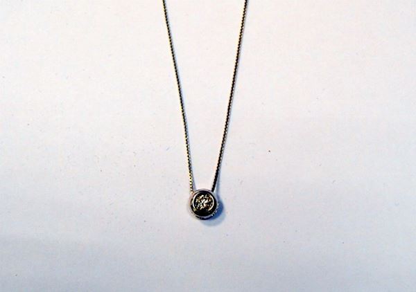 Collana punto luce in oro bianco e diamante