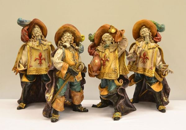 Quattro sculture, sec. XX, in terracotta,