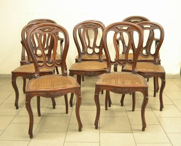 Sei sedie e due poltroncine, Inghilterra, sec. XIX, in mogano intagliato,