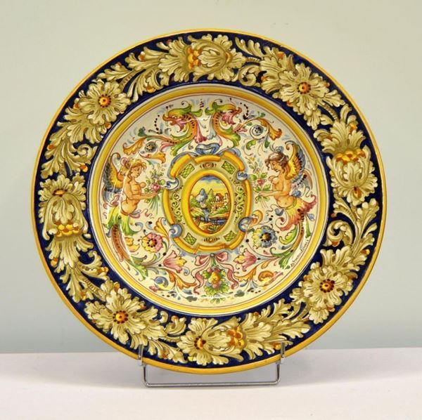 Piatto da parete, manifattura Mangani, sec. XX,  - Asta ARREDI, OGGETTI D'ARTE, DIPINTI E GIOIELLI - Poggio Bracciolini Casa d'Aste