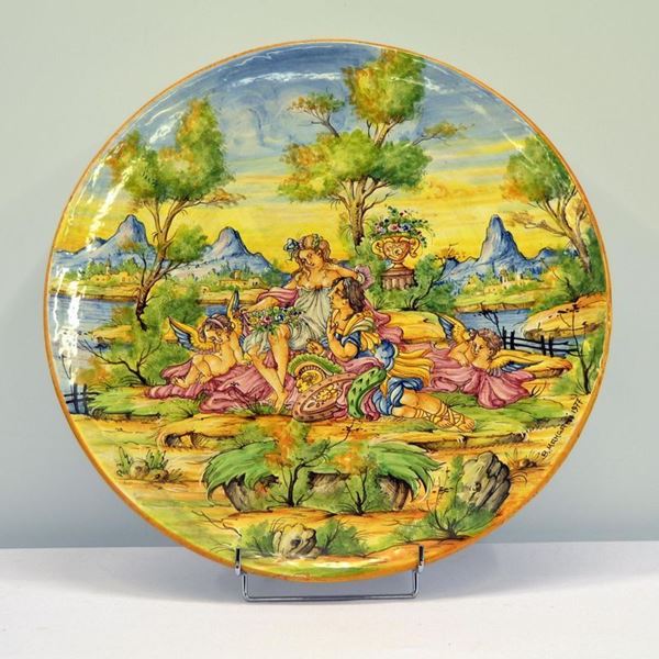 Piatto da parete, manifattura Mangani, sec. XX,  - Asta ARREDI, OGGETTI D'ARTE, DIPINTI E GIOIELLI - Poggio Bracciolini Casa d'Aste