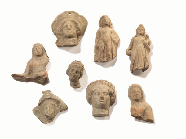 LOTTO DI OTTO STATUETTE VOTIVE, IV-III SECOLO A. C.