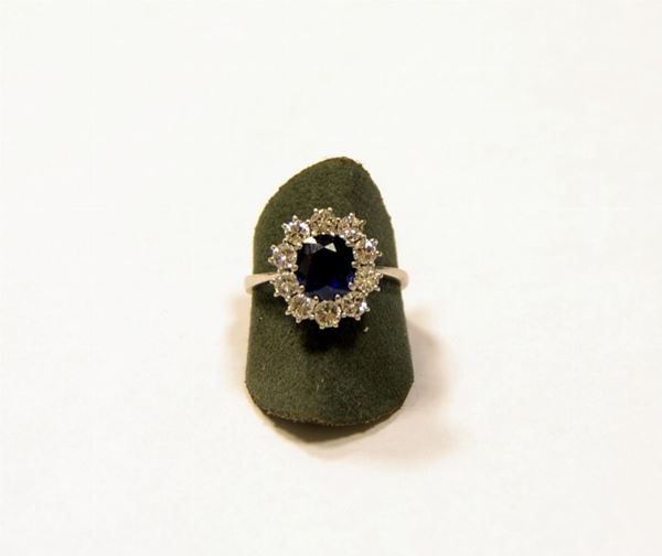 ANELLO IN ORO BIANCO, DIAMANTI E ZAFFIRO