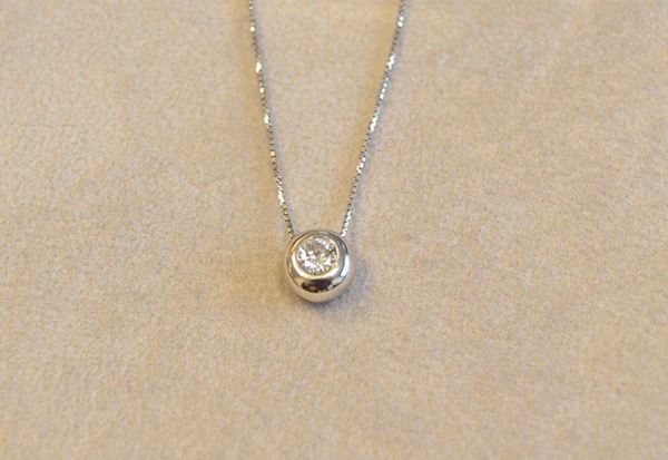 COLLANA IN ORO BIANCO E DIAMANTE , PUNTO LUCE