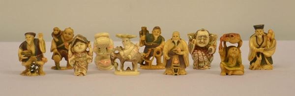 Dieci netsuke, sec. XX, in avorio,