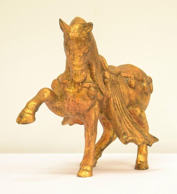 Scultura, sec. XX, in metallo dorato,