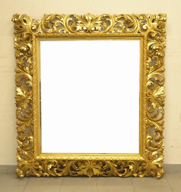 Specchiera, inizi sec. XX, entro cornice dorata e
