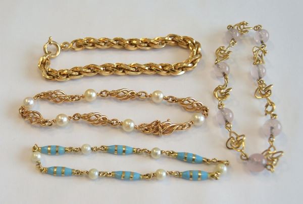QUATTRO&nbsp; BRACCIALI IN ORO GIALLO&nbsp; E PIETRE