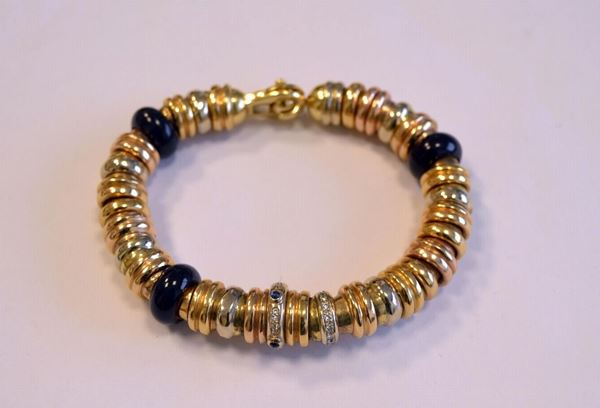 BRACCIALE , IN ORO GIALLO, ORO BIANCO, DIAMANTI E PIETRE