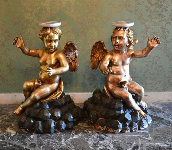 Coppia di basi, inizi sec. XX, in legno dorato e