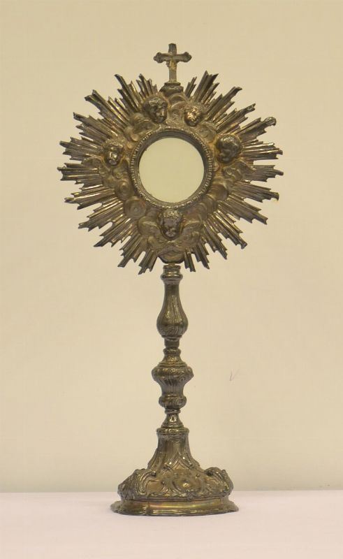Ostensorio, sec. XVIII, in argento inciso con