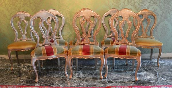 Otto sedie, in stile 700, in legno laccato,