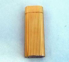 ACCENDINO, CARTIER, PLACCATO IN ORO GIALLO