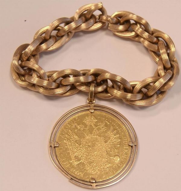 BRACCIALE IN ORO GIALLO  - Asta MOBILI, DIPINTI, OGGETTI D'ARTE E GIOIELLI - Poggio Bracciolini Casa d'Aste