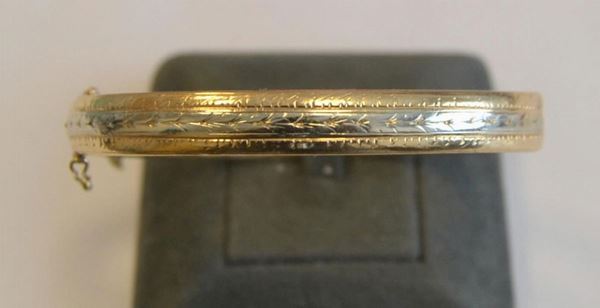 BRACCIALE IN ORO GIALLO E ORO BIANCO  - Asta MOBILI, DIPINTI, OGGETTI D'ARTE E GIOIELLI - Poggio Bracciolini Casa d'Aste