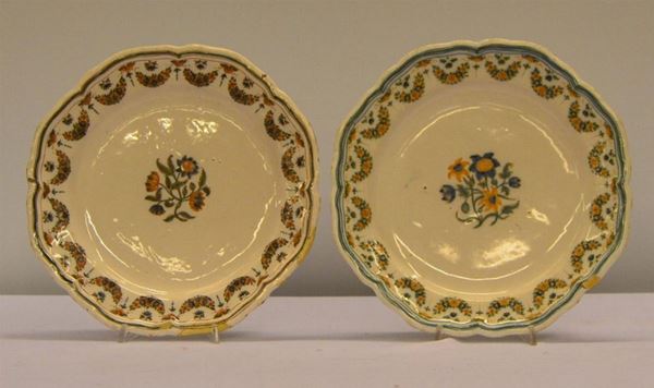 Due piatti, Italia settentrionale, fine sec. XVIII, in maiolica decorata in&nbsp; policromia, bordo sagomato decorato da filettatura, tesa dipinta a festoni vegetali, al centro del cavetto un mazzo di fiori, diam. cm 28&nbsp;&nbsp;&nbsp;&nbsp;&nbsp;&nbsp;&nbsp;&nbsp;&nbsp;&nbsp;&nbsp;&nbsp;&nbsp;&nbsp;&nbsp;&nbsp;&nbsp;&nbsp;&nbsp;&nbsp;&nbsp;&nbsp;&nbsp;&nbsp;&nbsp;&nbsp;&nbsp;&nbsp;&nbsp;&nbsp;&nbsp;&nbsp;&nbsp;&nbsp;&nbsp;&nbsp;&nbsp;&nbsp;&nbsp;&nbsp;&nbsp;&nbsp;&nbsp;&nbsp;&nbsp;&nbsp;&nbsp;&nbsp;&nbsp;&nbsp;&nbsp;&nbsp;&nbsp;&nbsp;&nbsp;&nbsp;&nbsp;&nbsp;&nbsp;&nbsp;&nbsp;&nbsp;&nbsp;