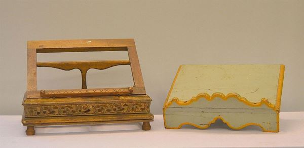 Due leggii, sec. XIX, in legno laccato e intagliato,