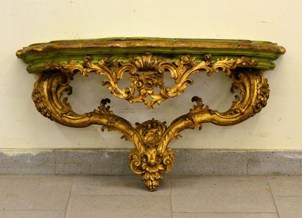 Consolle da parete, inizi sec. XX, in legno dorato e