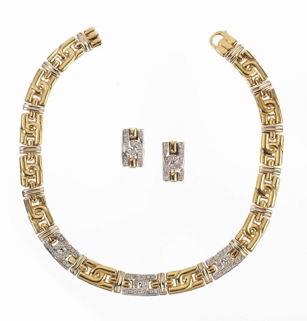 DEMI-PARURE IN ORO GIALLO, ORO BIANCO E DIAMANTI