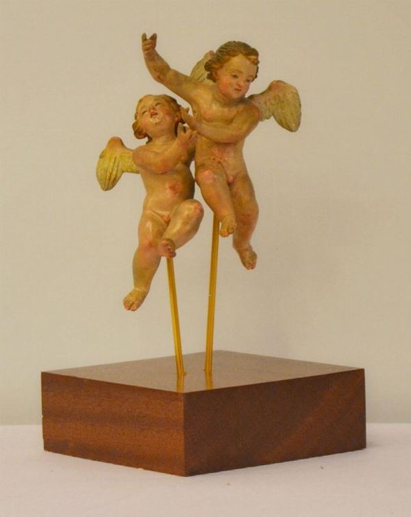 Due putti, Napoli, sec. XVIII, in terracotta dipinta,