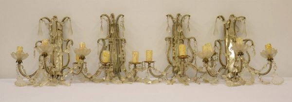 Quattro applique, fine sec. XIX, tre luci,