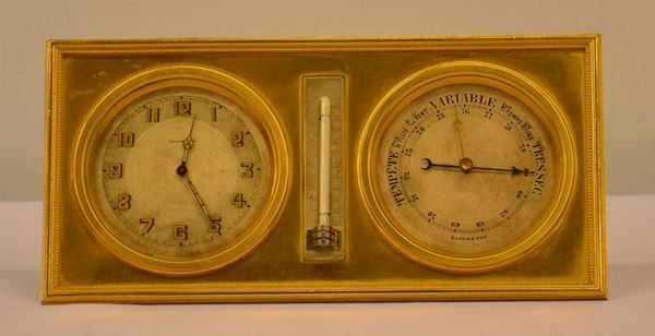 Orologio da tavolo, inizi sec. XX, in metallo dorato,