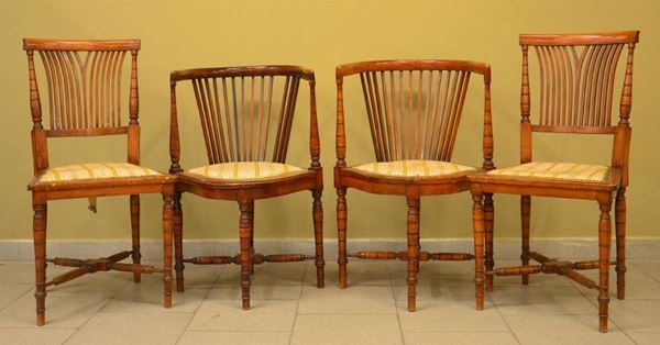 Coppia di poltroncine e coppia di sedie, inizi sec. XX, in noce sagomato