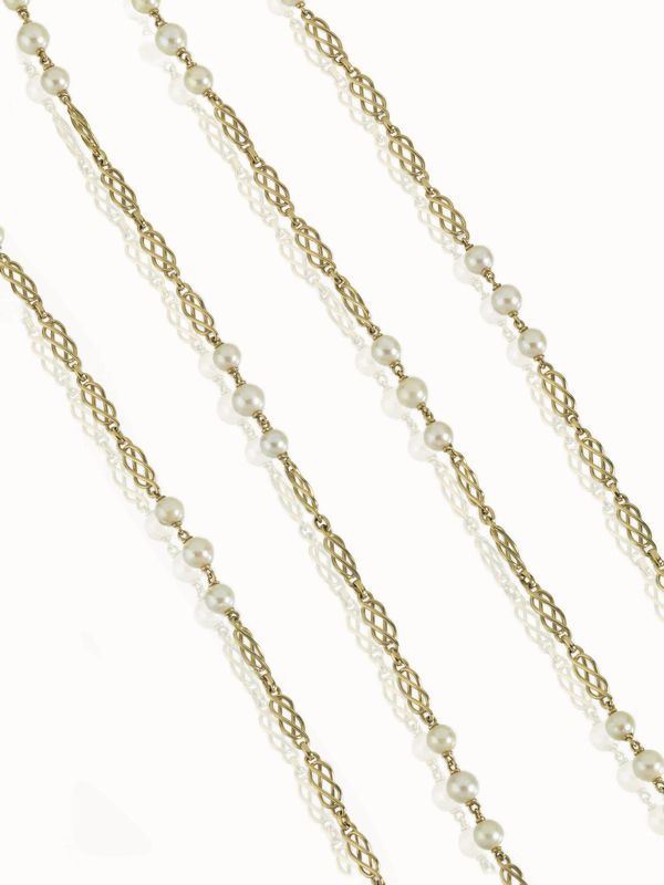 LUNGA COLLANA IN ORO GIALLO E PERLE