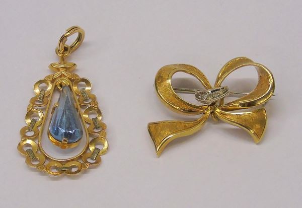 SPILLA IN ORO GIALLO E DIAMANTI