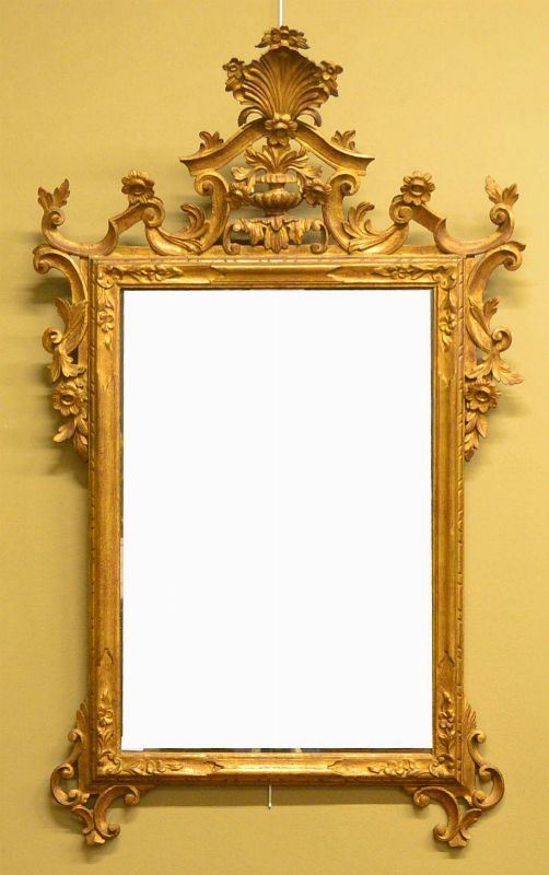 Specchiera, in stile 700, entro cornice in legno laccato e