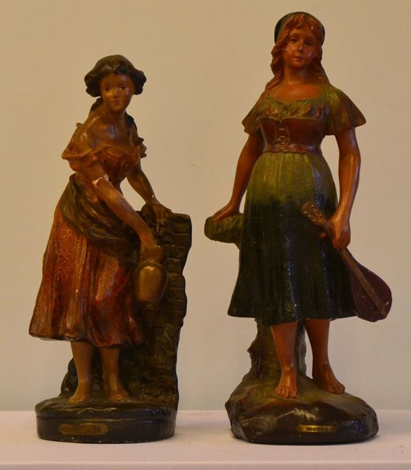 Due sculture, sec. XX, in gesso, raffiguranti                             